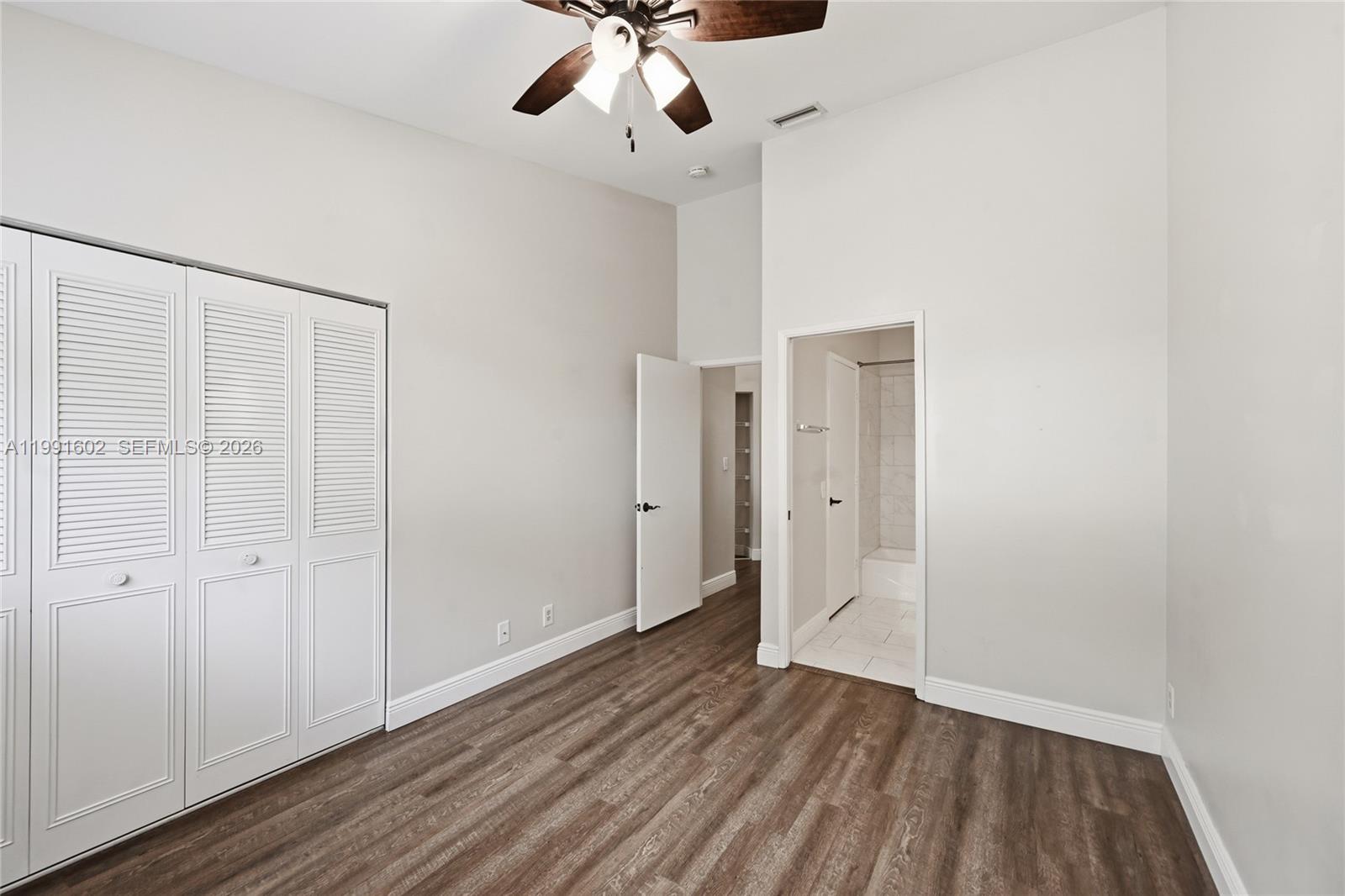6215 Old Court Road, Unit 505 Boca Raton, FL 33433 - Photo 16 of 36 wooden floor in an empty room with a window