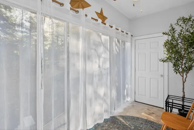 a bathroom with a shower curtain