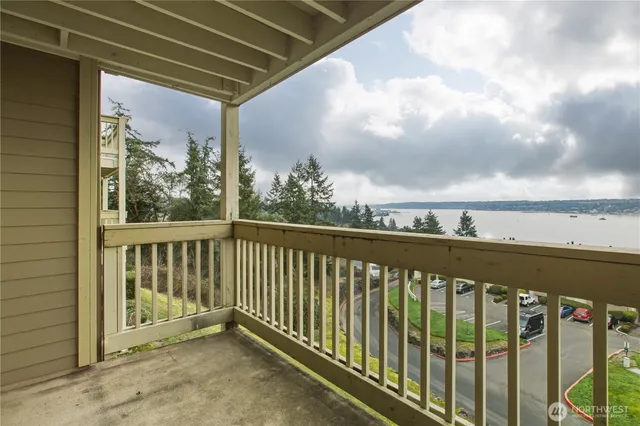 a view of a balcony with city view