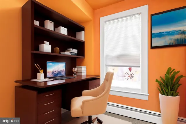 a room with furniture and a window