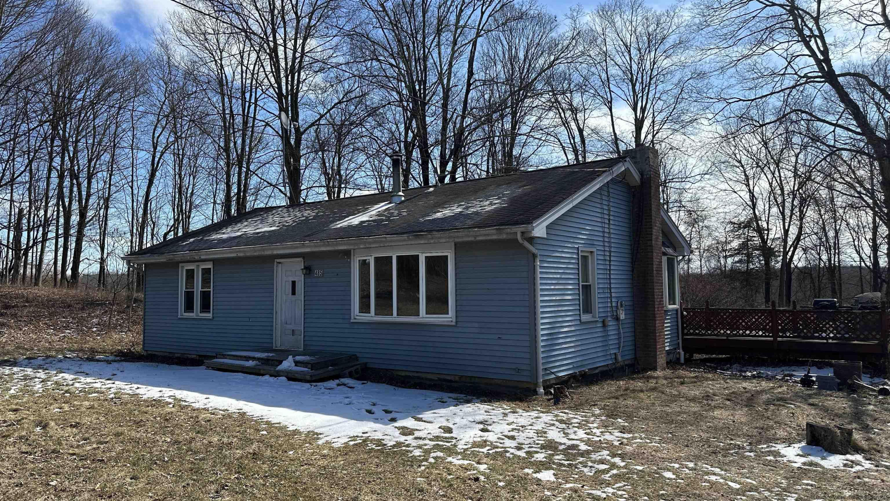 485 Red Top Road Highland, NY 12528 - Photo 1 of 9 a view of backyard with wooden fence and large trees