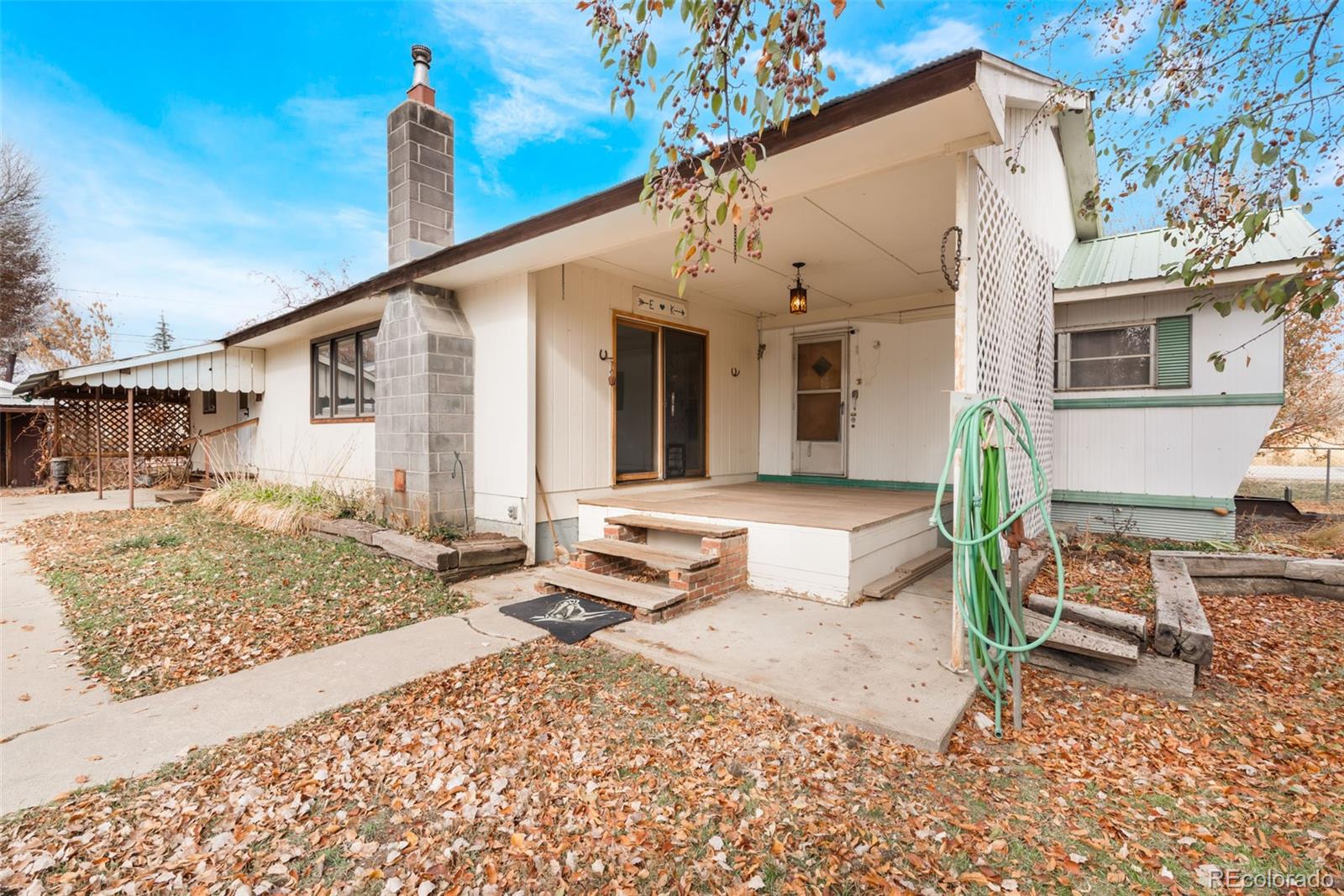 149 North 3rd Street Hayden, CO 81639 - Photo 11 of 41 a front view of a house with garden