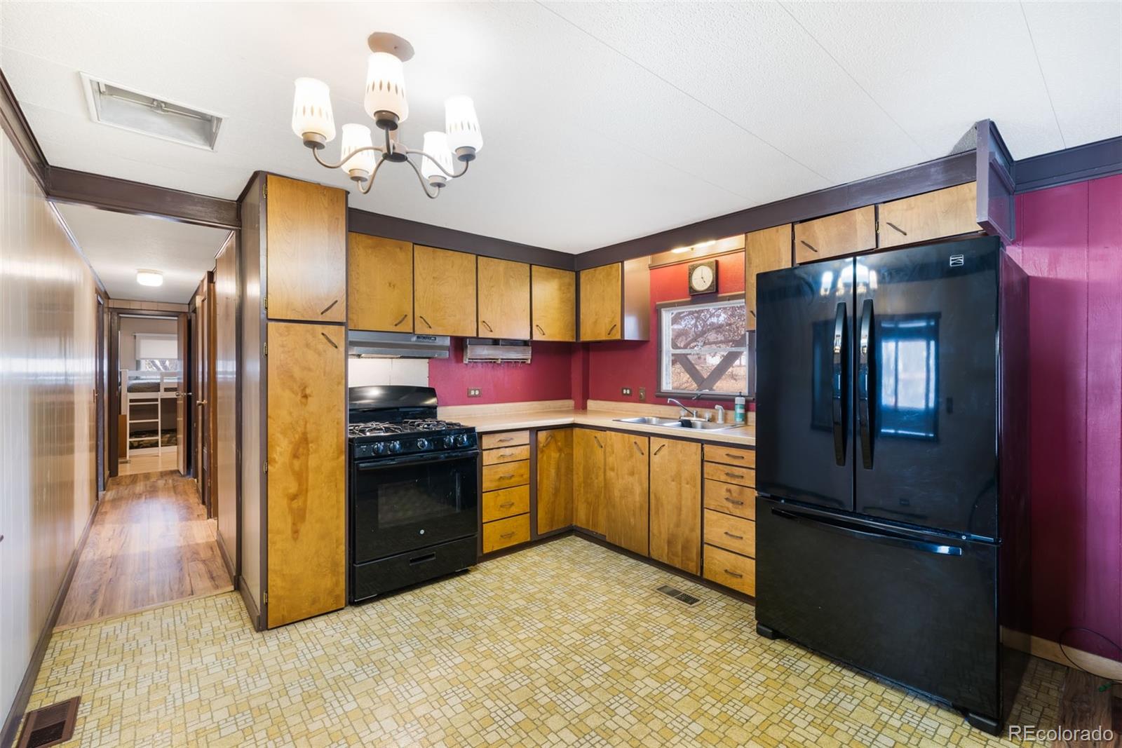 149 North 3rd Street Hayden, CO 81639 - Photo 15 of 41 a kitchen with a refrigerator and countertop