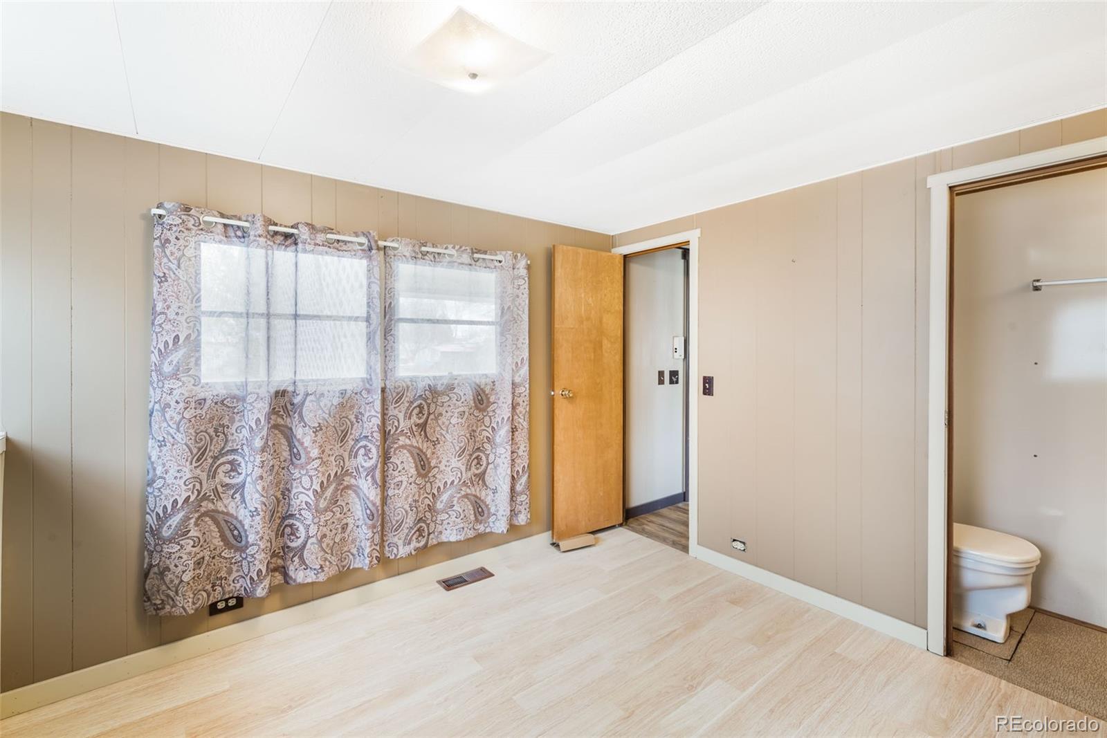 149 North 3rd Street Hayden, CO 81639 - Photo 19 of 41 a view of an empty room with a window and bathroom