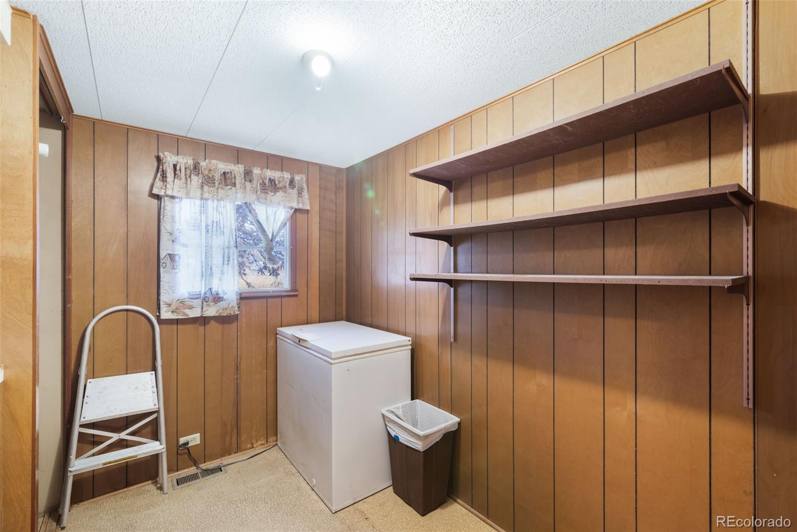 149 North 3rd Street Hayden, CO 81639 - Photo 21 of 41 a bathroom with a toilet and a shower curtain
