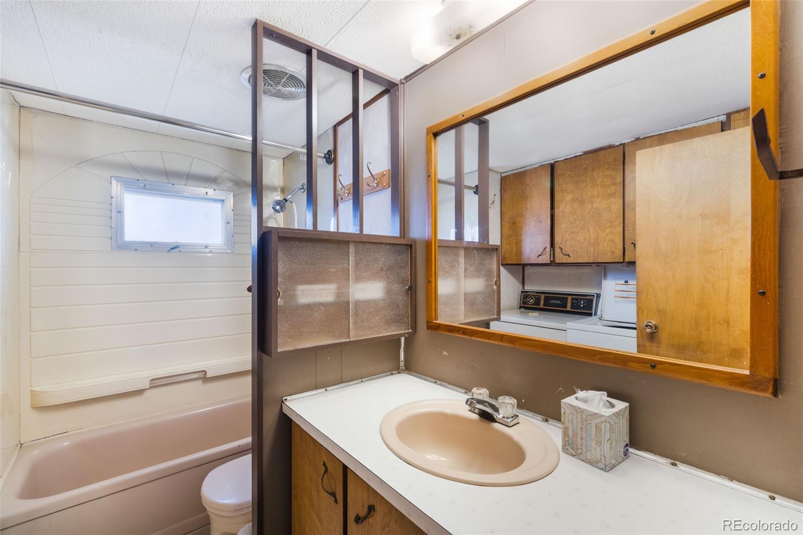 149 North 3rd Street Hayden, CO 81639 - Photo 26 of 41 a bathroom with a sink a toilet and a mirror