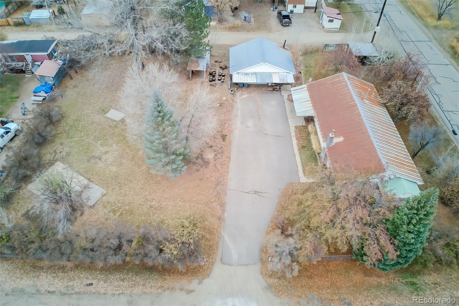 149 North 3rd Street Hayden, CO 81639 - Photo 3 of 41 an aerial view of a house with a yard