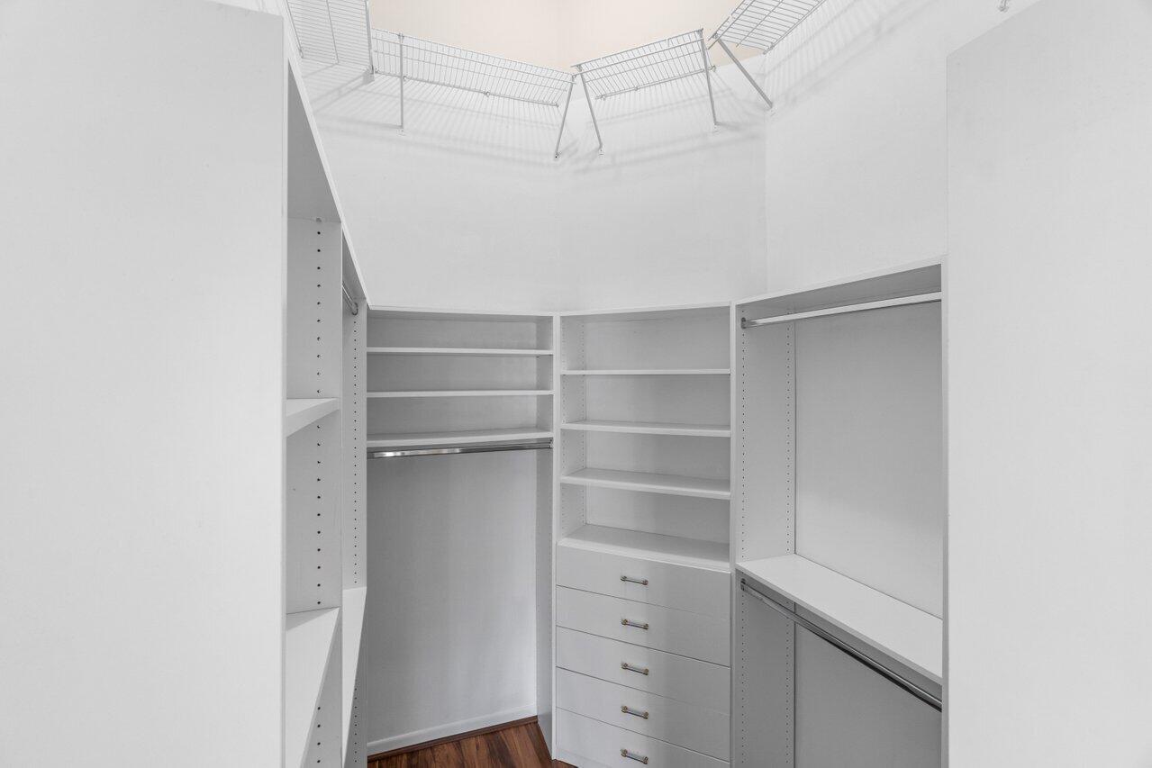 23458 Torre Circle Boca Raton, FL 33433 - Photo 17 of 36 a view of a walk in closet