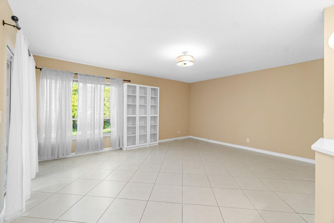 23458 Torre Circle Boca Raton, FL 33433 - Photo 22 of 36 an empty room with windows