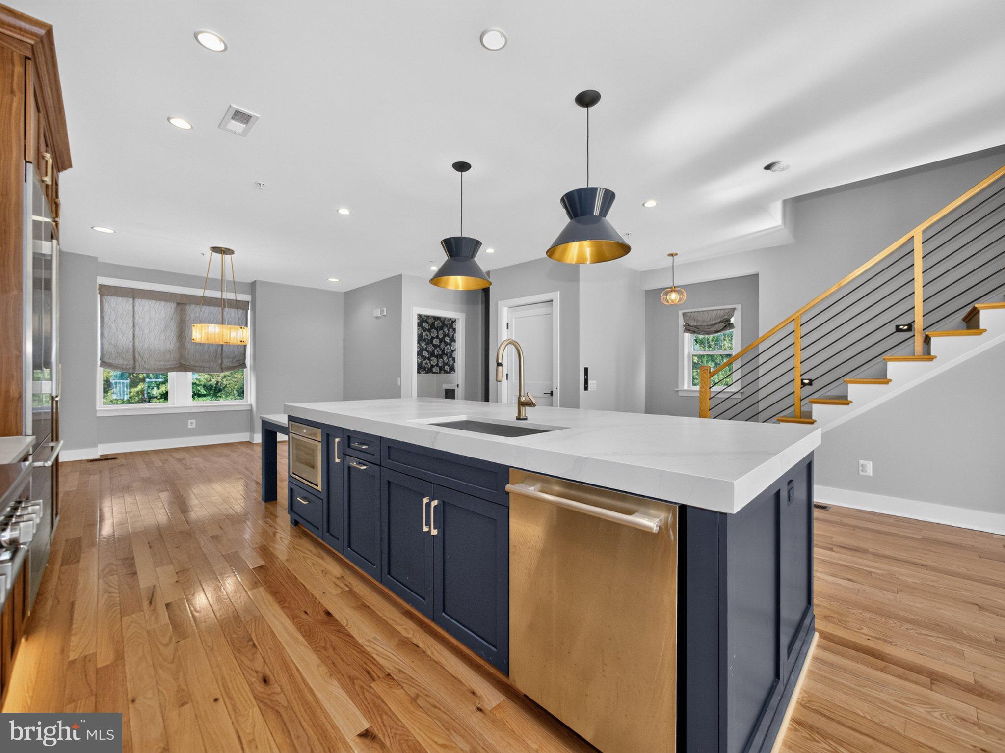 17217 Redland Road Rockville, MD 20855 - Photo 16 of 44 Island with additional seating and inset microwave