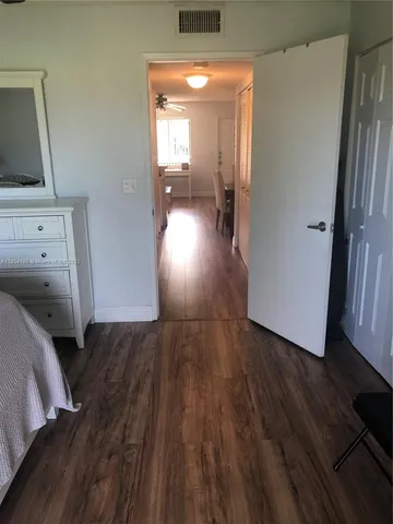 a view of balcony with furniture