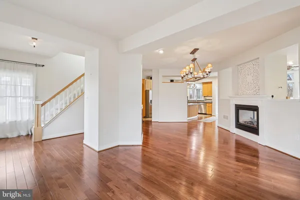 a stove top oven sitting inside of a kitchen