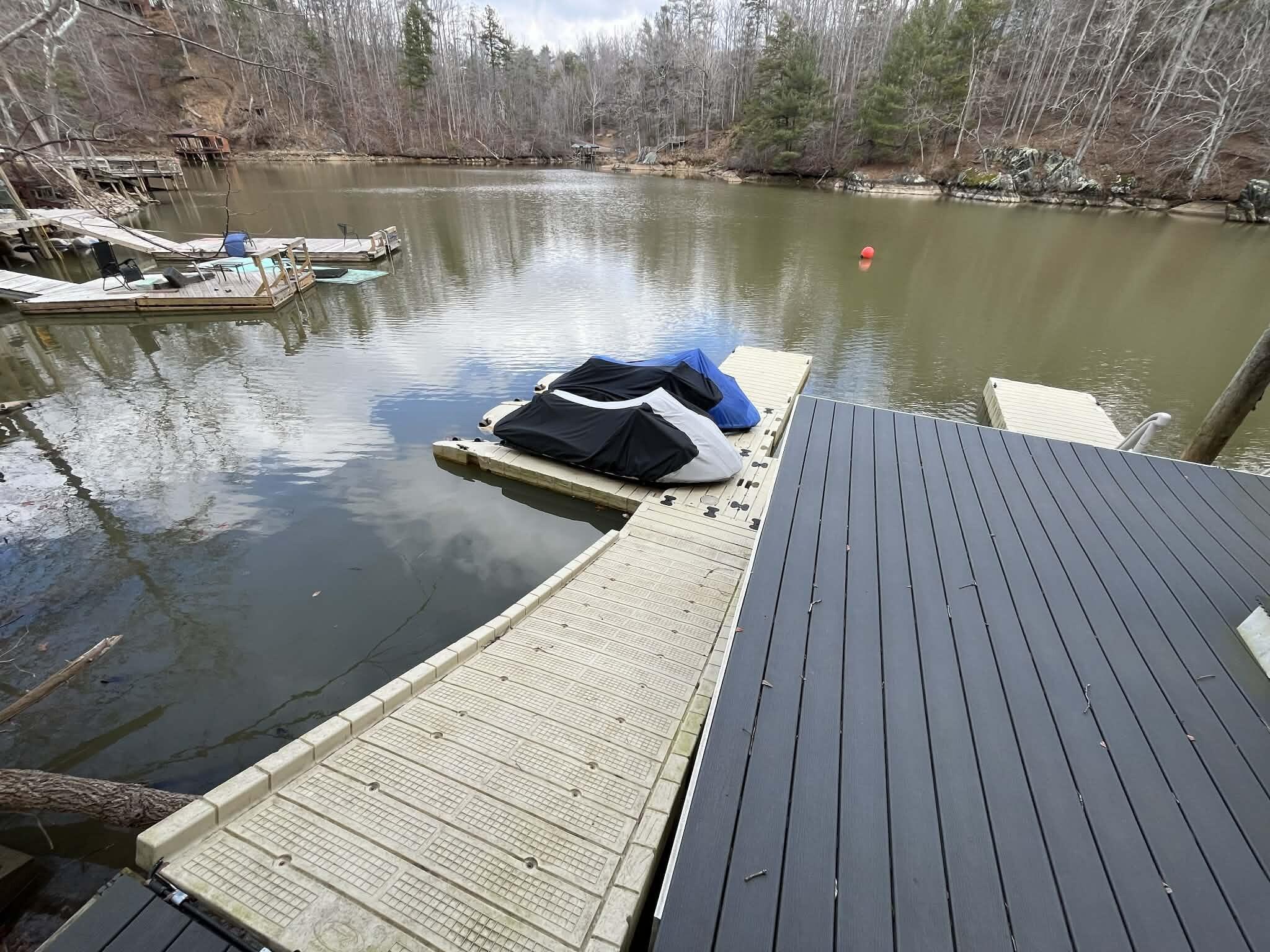 512 Ridgelake Road Goodview, VA 24095 - Photo 6 of 17 a view of a wooden floor with a lake