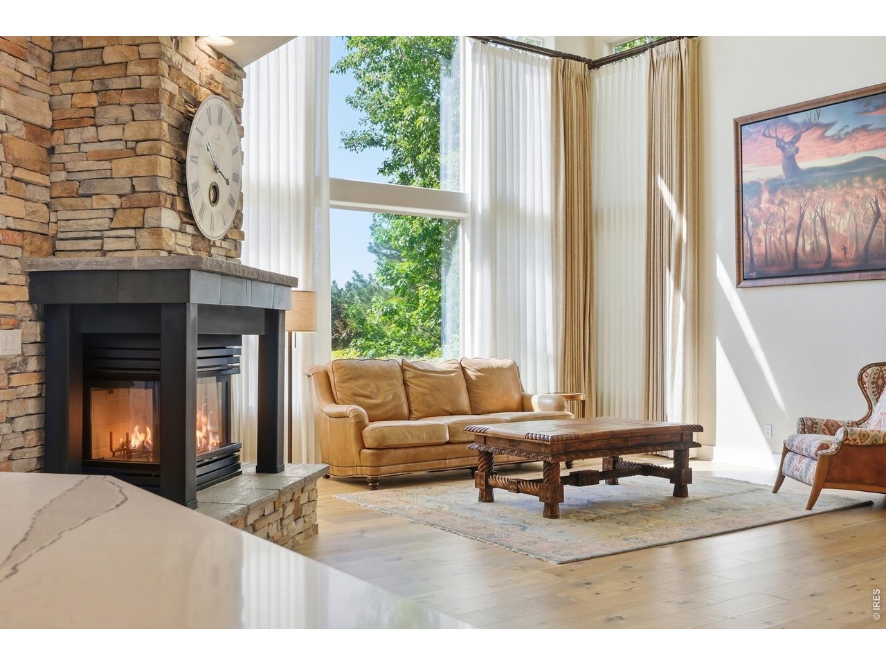 718 Skywalker Point Lafayette, CO 80026 - Photo 8 of 48 Hardwood floors, gas fireplace, golf course views