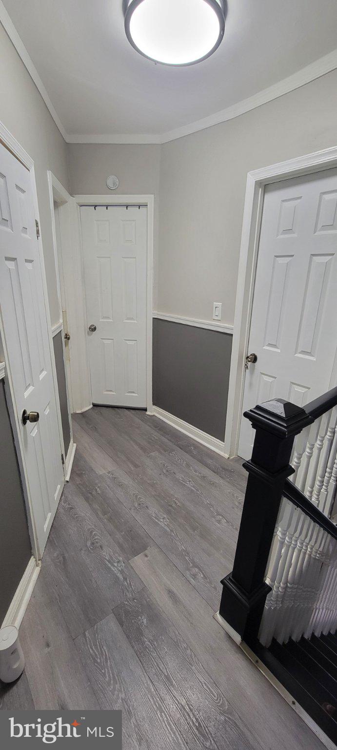 209 North 10th Street Darby, PA 19023 - Photo 19 of 26 Inviting hallway with modern charm.