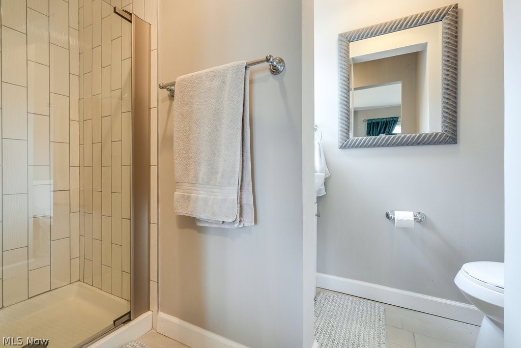 16010 Fernway Road Cleveland, OH 44120 - Photo 16 of 30 Bathroom with toilet, walk in shower, and tile floors