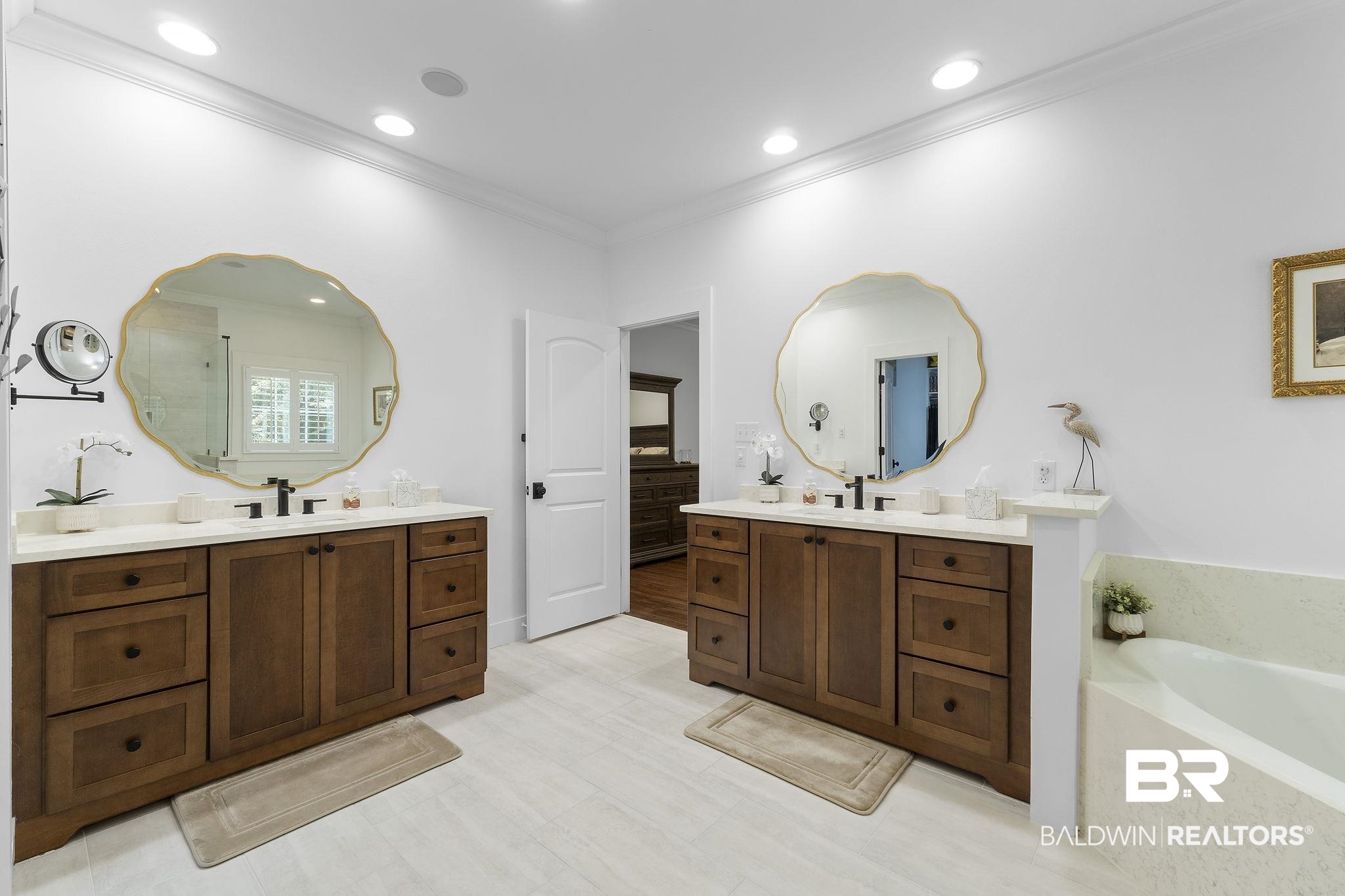 4451 Millhouse Road Gulf Shores, AL 36542 - Photo 30 of 50 Bathroom with crown molding, tile patterned flooring, dual bowl vanity, and a tub to relax in