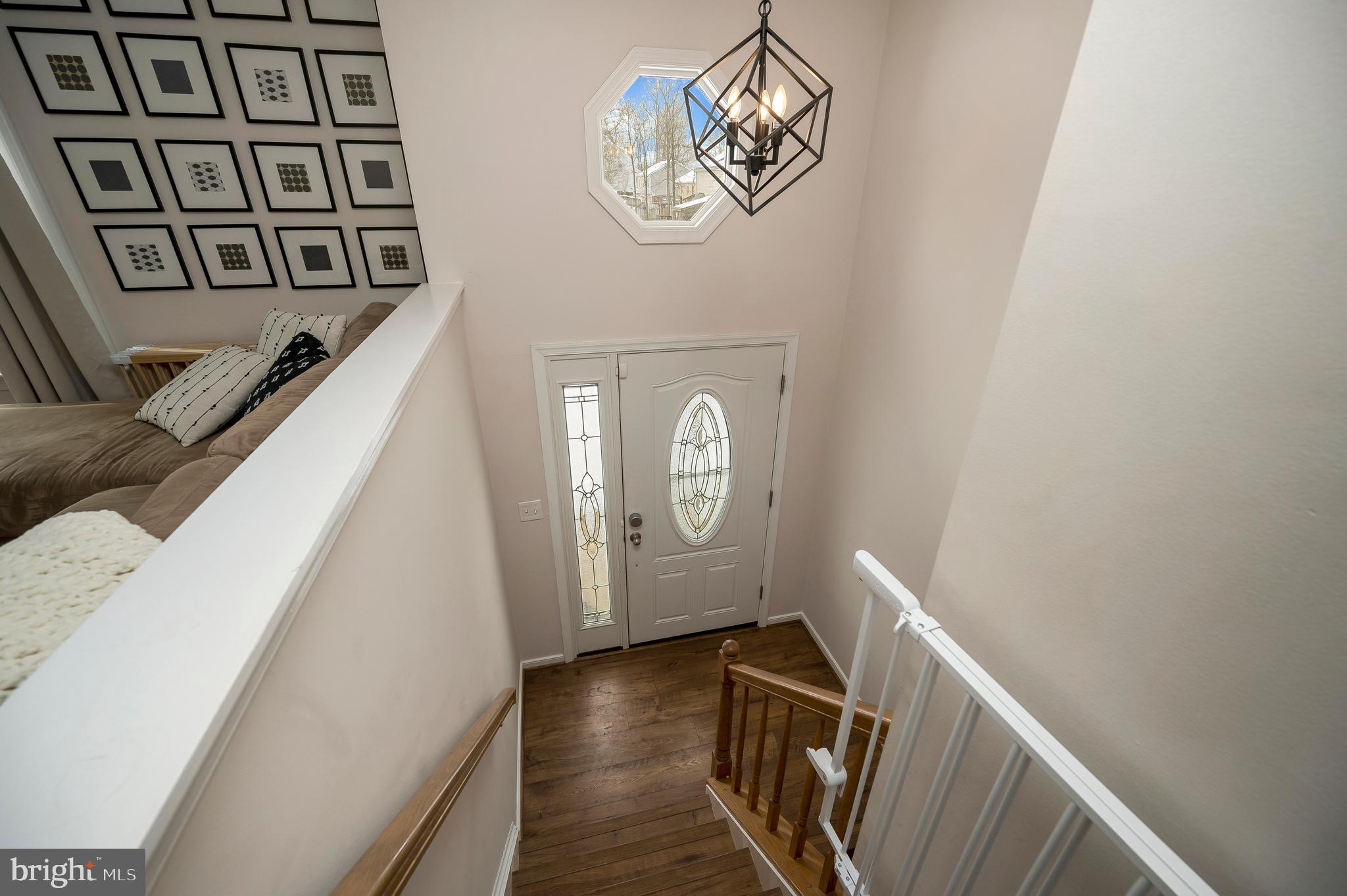 228 Choptank Road Stafford, VA 22556 - Photo 25 of 51 a view of a hallway with wooden floor