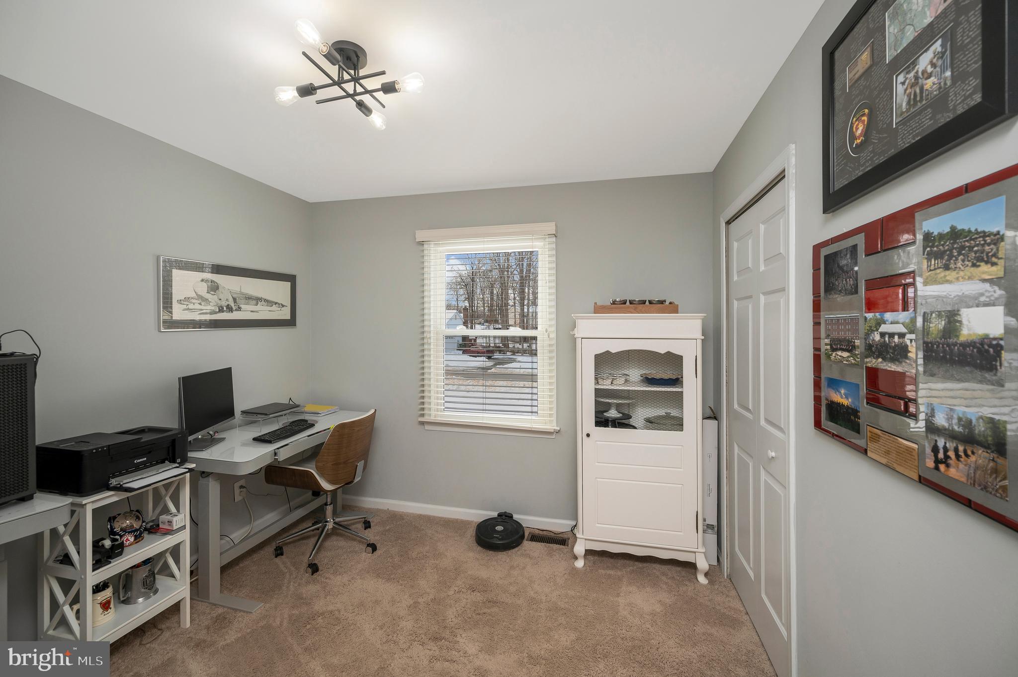 228 Choptank Road Stafford, VA 22556 - Photo 27 of 51 a view of a workspace with furniture and a window
