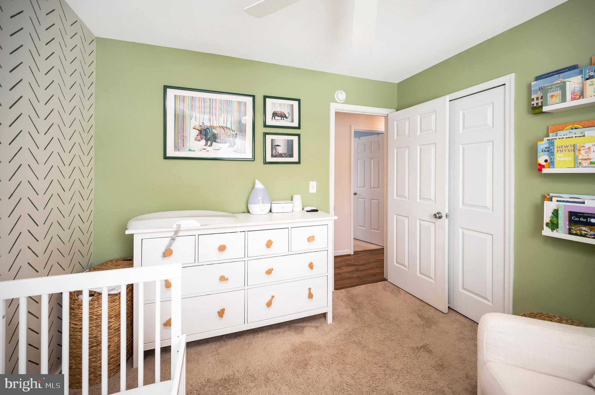 228 Choptank Road Stafford, VA 22556 - Photo 31 of 51 a bedroom with a bed a painting on the wall and a window