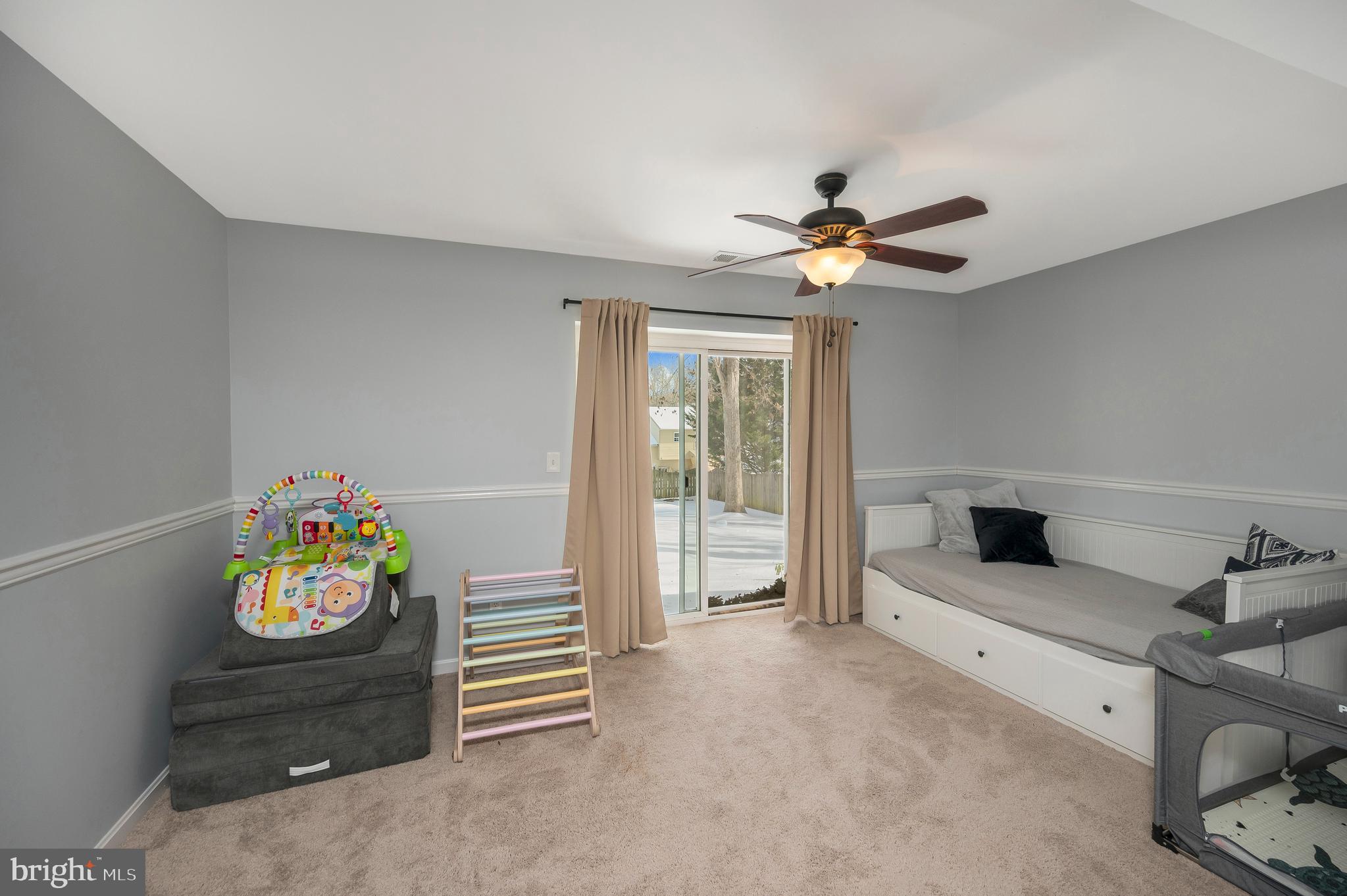 228 Choptank Road Stafford, VA 22556 - Photo 42 of 51 a living room with furniture and a flat screen tv