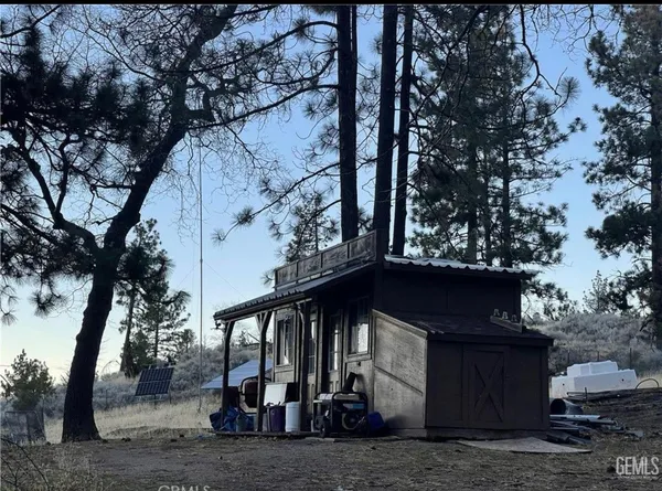 a building with trees in front of it