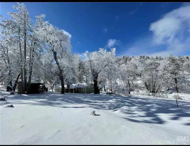 a view of a house with a snow