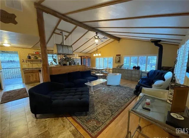 a living room with furniture and a rug