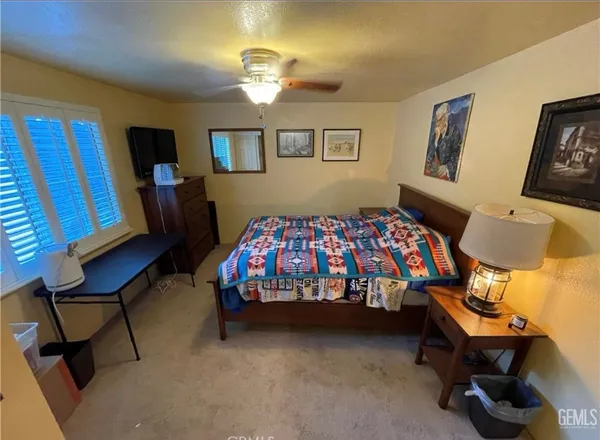 a view of a chairs and table in a room