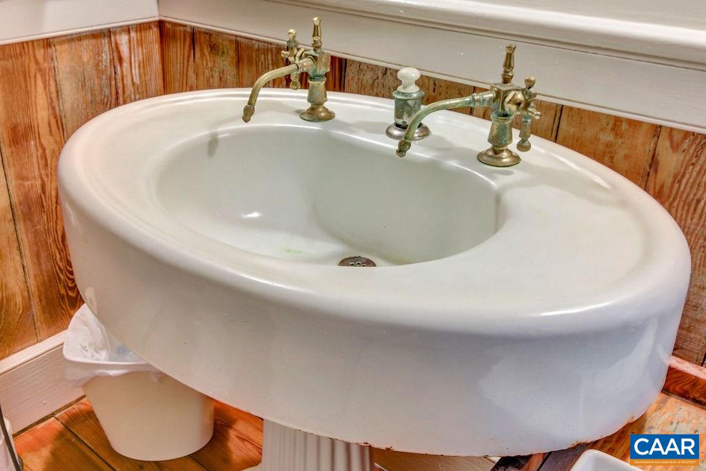 674 Octonia Road Stanardsville, VA 22973 - Photo 21 of 38 a bathroom with a sink and a mirror