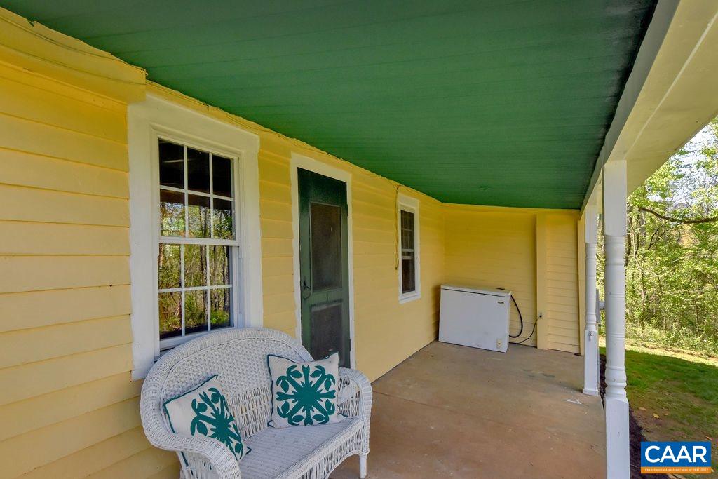 674 Octonia Road Stanardsville, VA 22973 - Photo 32 of 38 a front view of a house with a garden