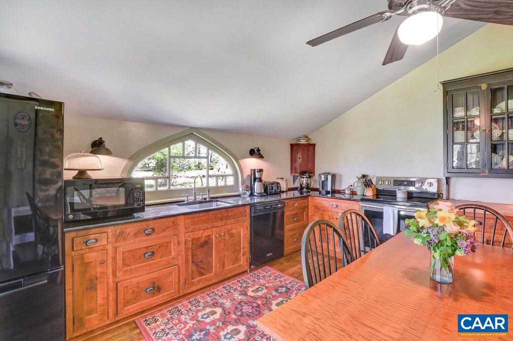 674 Octonia Road Stanardsville, VA 22973 - Photo 8 of 38 a view of a kitchen and dining room
