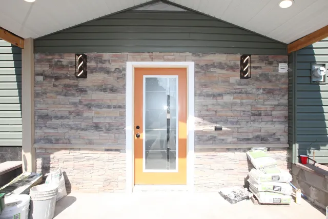 a picture of a bathroom with a shower