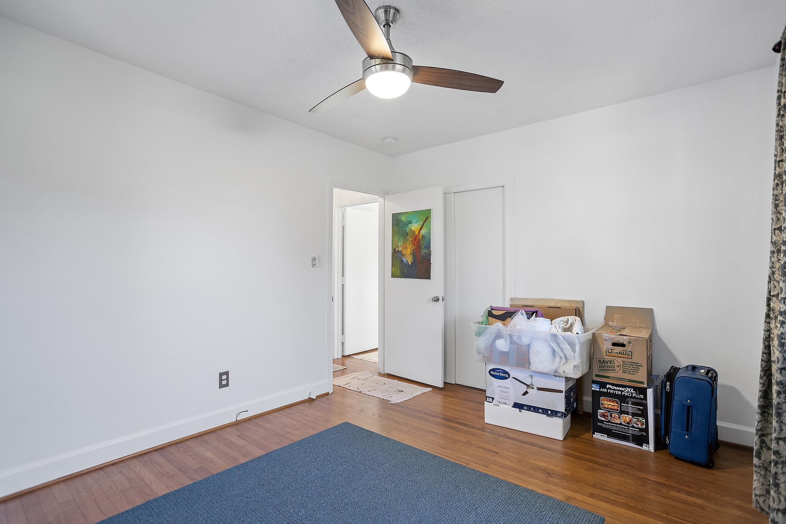 724 East Whitaker Mill Road Raleigh, NC 27608 - Photo 28 of 35 a view of livingroom with furniture and wooden floor