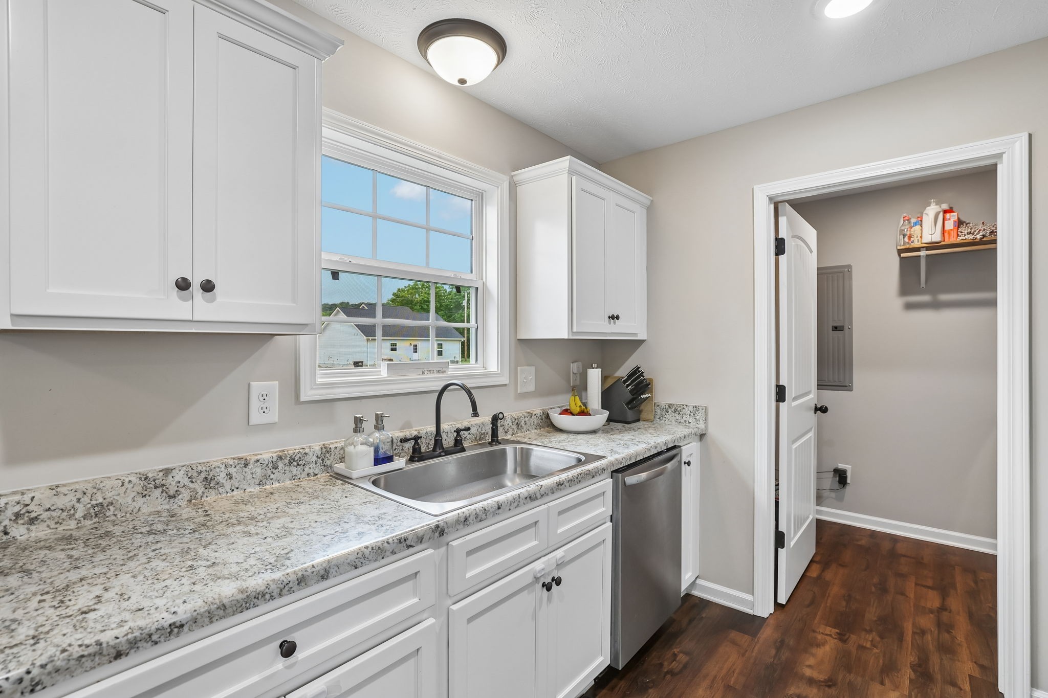 1715 Old Belfast Road Lewisburg, TN 37091 - Photo 20 of 42 a kitchen with a sink and cabinets