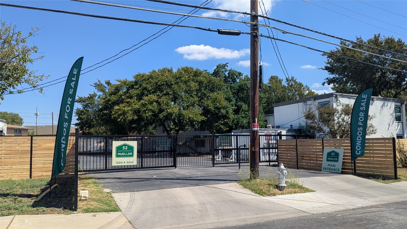 1200 East 52nd Street, Unit 210 Austin, TX 78723 - Photo 13 of 13 a view of a patio with a table and chairs