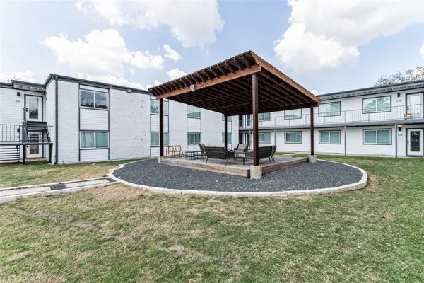 a view of a house with entertaining space