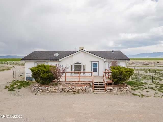 a view of a terrace with chairs