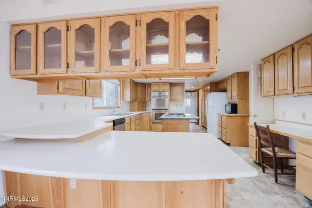 an empty room with a empty space and windows