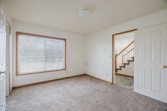 a view of a field with an ocean view