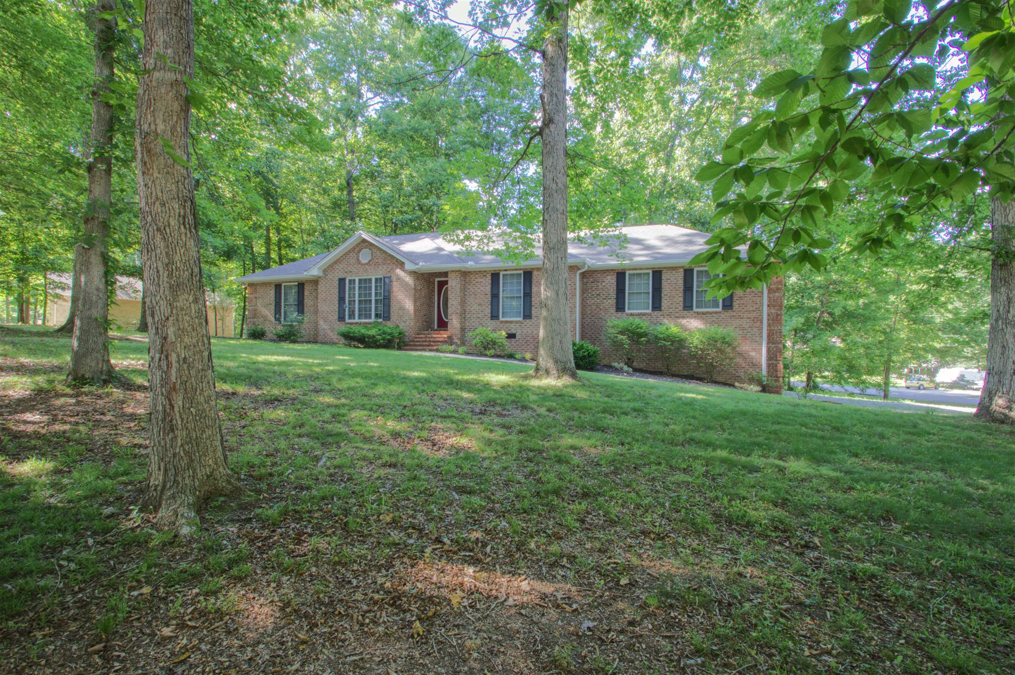 3002 Ruths Court Greenbrier, TN 37073 - Photo 1 of 23 a view of a house with yard and a garden