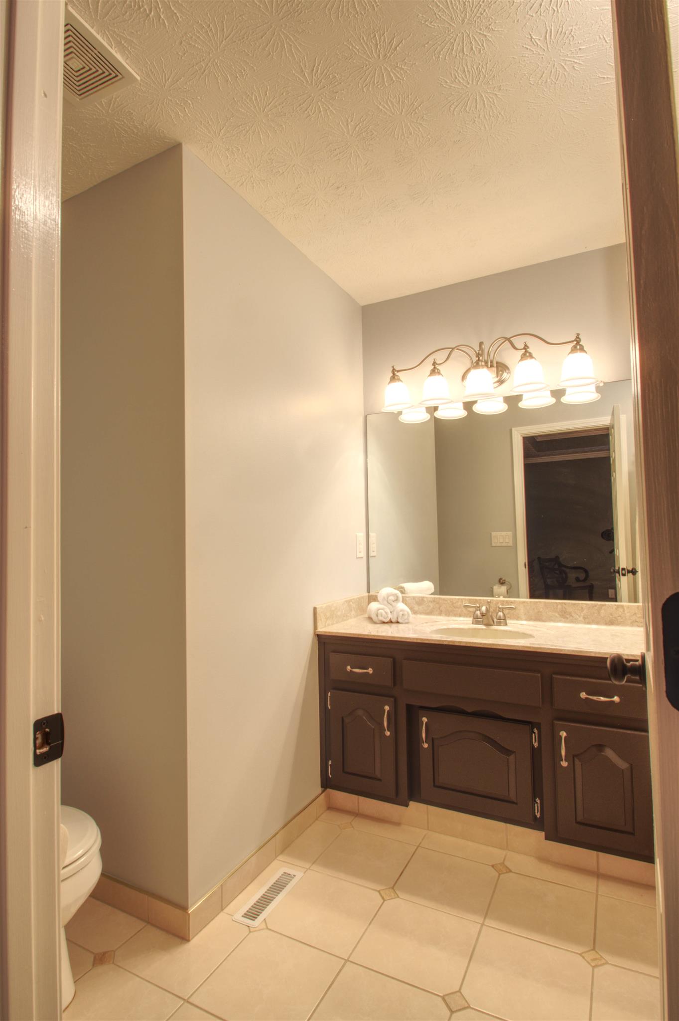 3002 Ruths Court Greenbrier, TN 37073 - Photo 11 of 23 a bathroom with a sink and a mirror