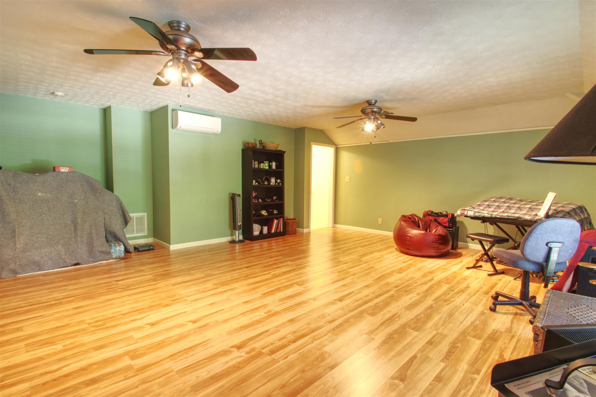 3002 Ruths Court Greenbrier, TN 37073 - Photo 20 of 23 a bedroom with a bed and a chandelier