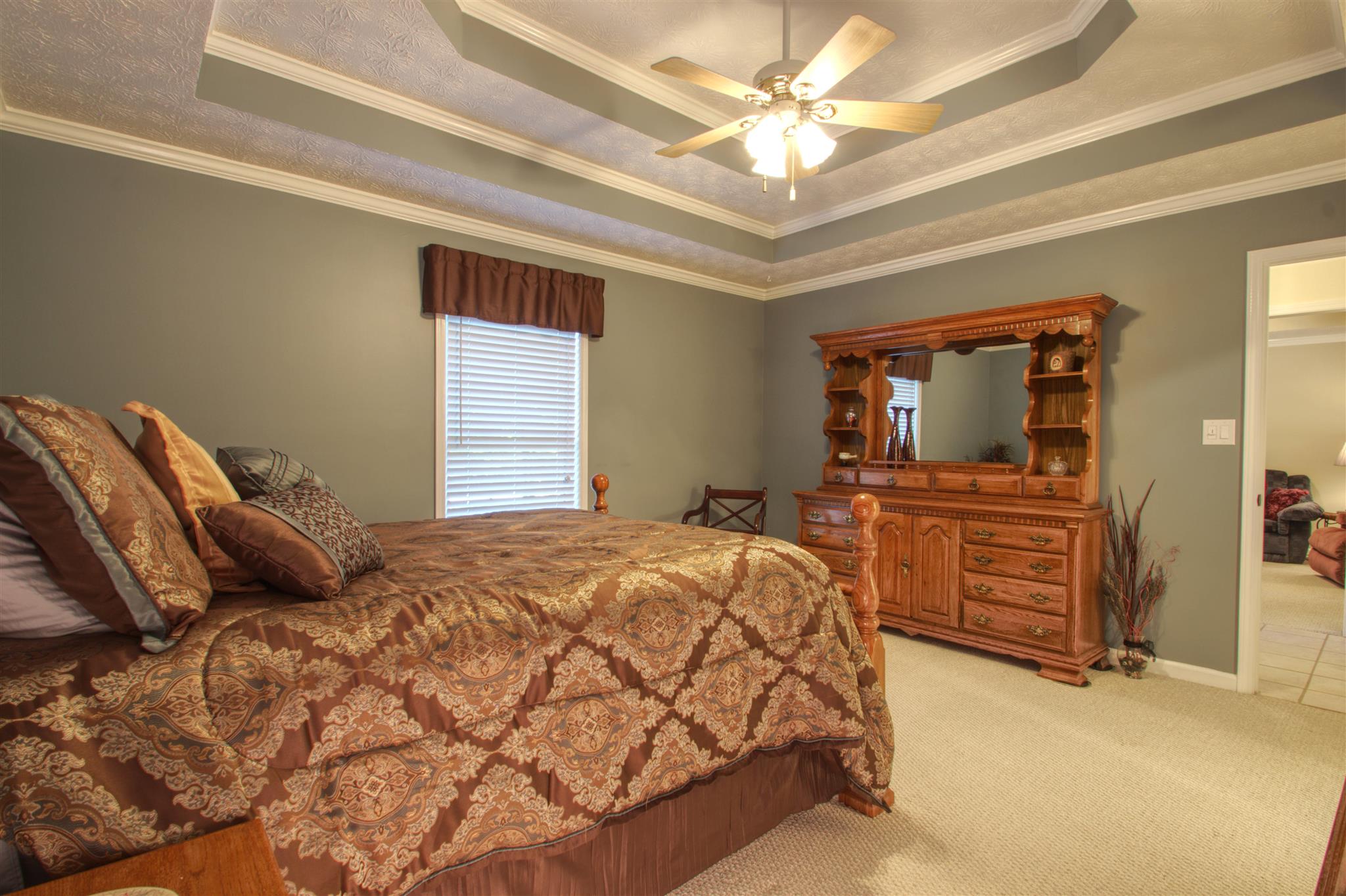 3002 Ruths Court Greenbrier, TN 37073 - Photo 10 of 23 a bedroom with a bed and a flat tv screen on dresser