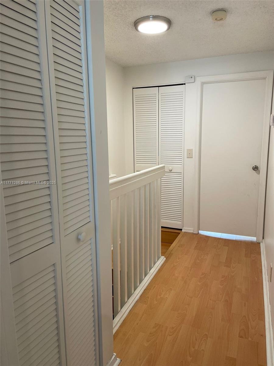9 Whitehead Circle, Unit 9 Weston, FL 33326 - Photo 14 of 22 a view of a hallway