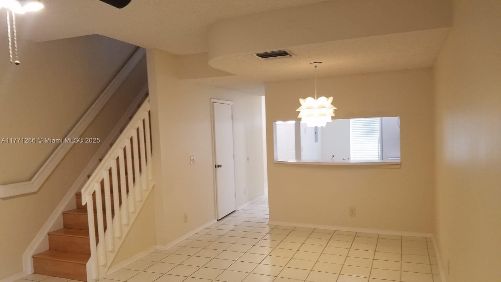 9 Whitehead Circle, Unit 9 Weston, FL 33326 - Photo 10 of 22 a view of an entryway