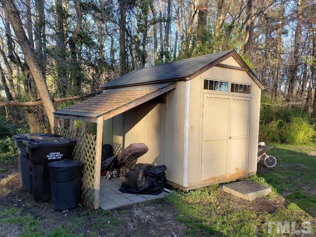 198 Pope Lake Road Angier, NC 27501 - Photo 18 of 19 a view of a house with backyard