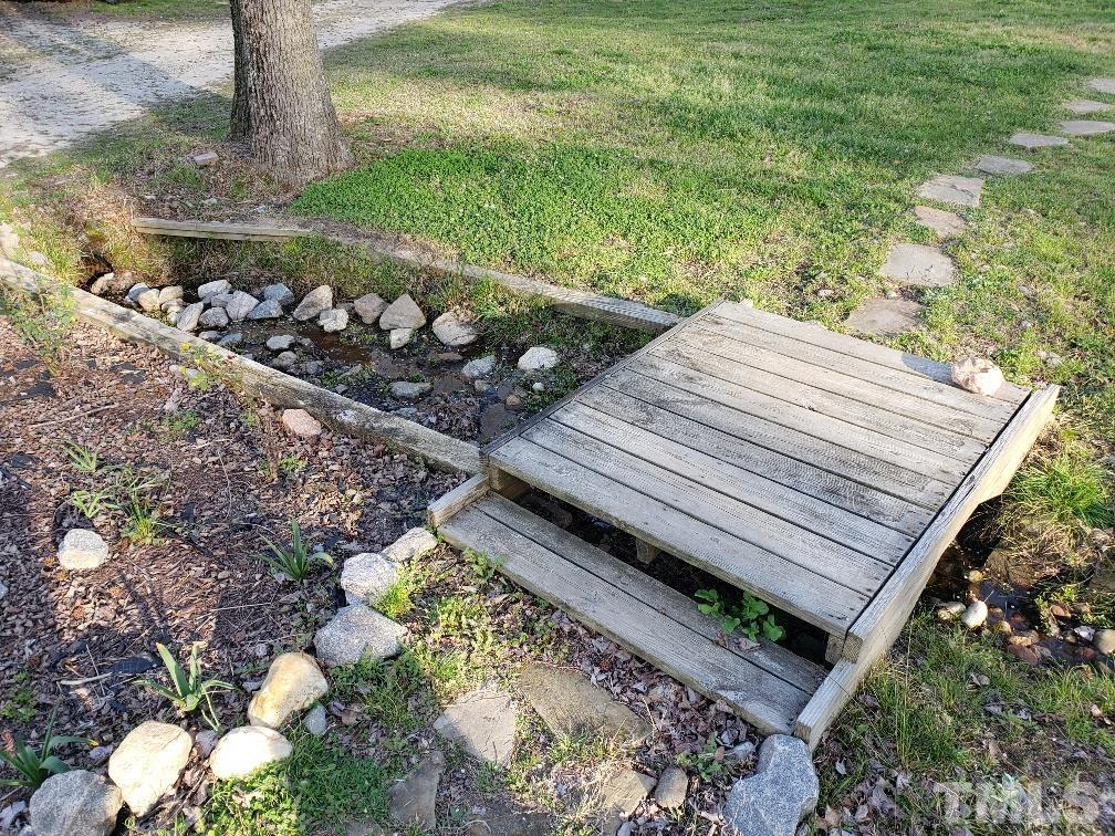 198 Pope Lake Road Angier, NC 27501 - Photo 19 of 19 a view of a wooden floor with a yard