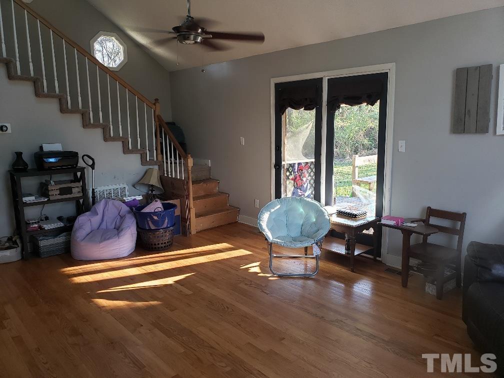 198 Pope Lake Road Angier, NC 27501 - Photo 5 of 19 a room with lots of furniture and wooden floor