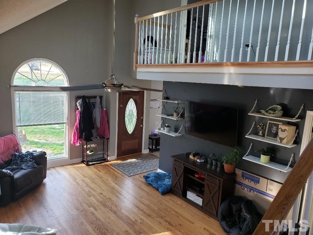 198 Pope Lake Road Angier, NC 27501 - Photo 9 of 19 a living room with furniture a window and a fireplace